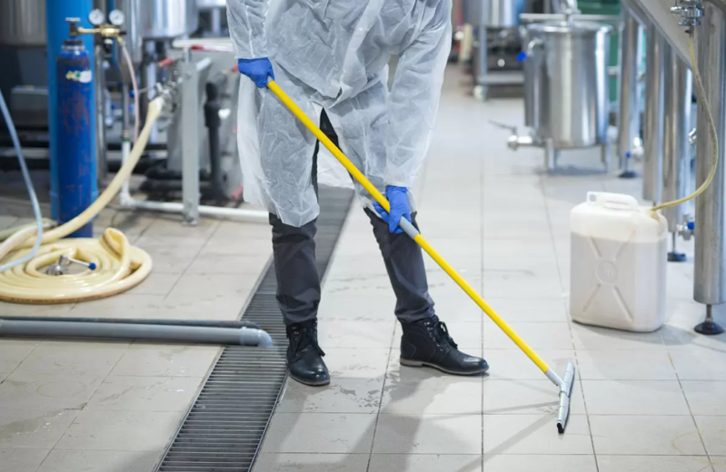 industrial cleaning perth team cleaning large warehouse floor
