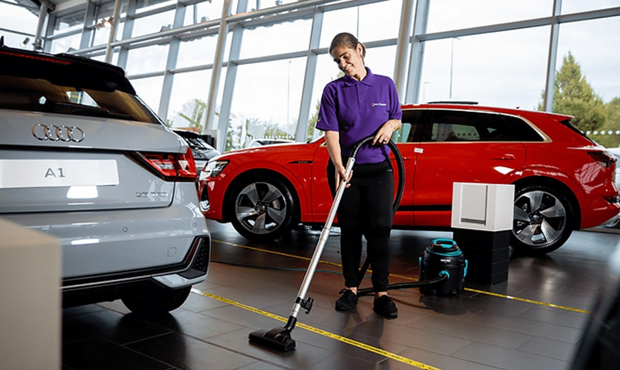 • car showroom cleaning perth gleaming floor with vehicles on display
