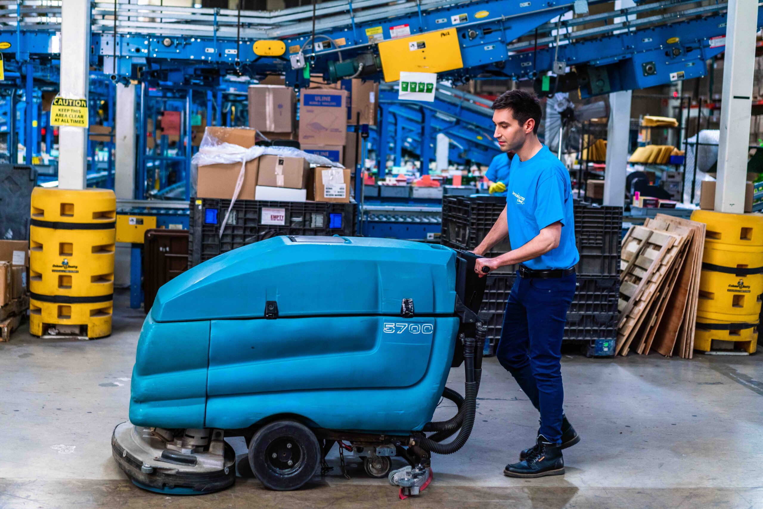 • warehouse facility cleaning perth team in hi-vis gear