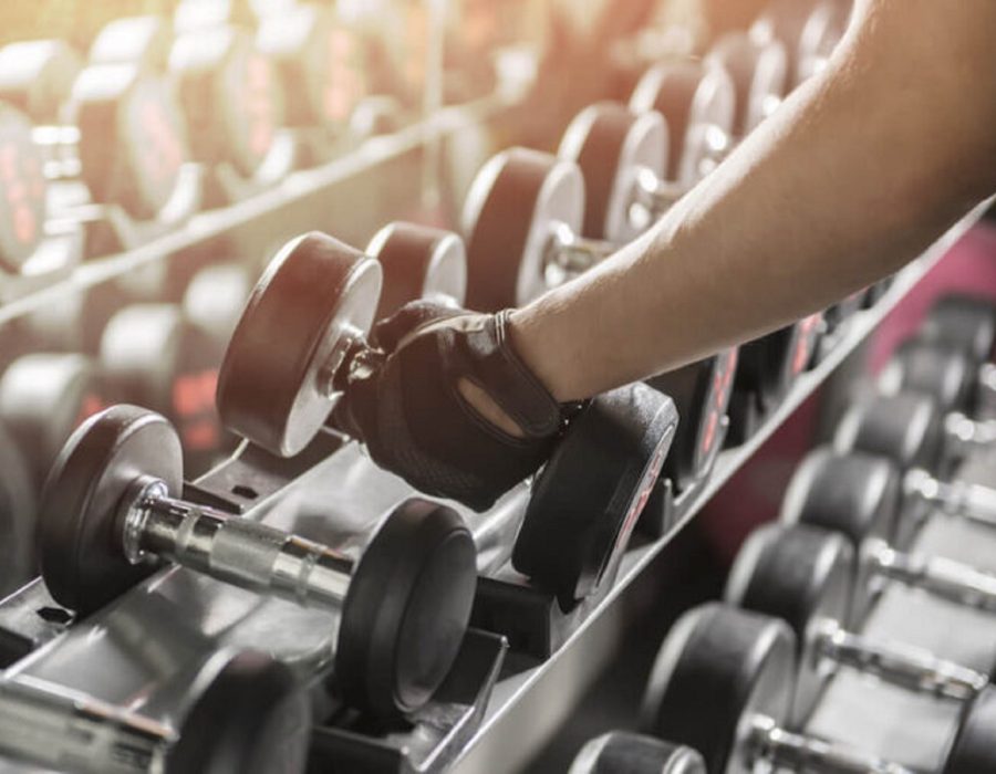 • fitness centre cleaning perth team mopping weights room floor